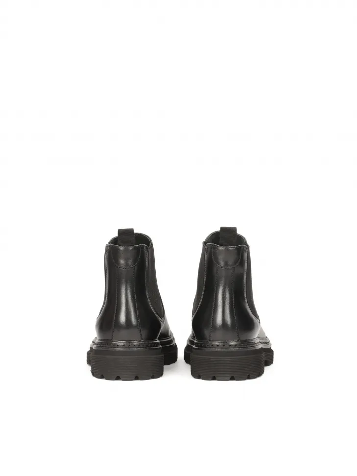 Bottines Chelsea en cuir noir à semelle superposée